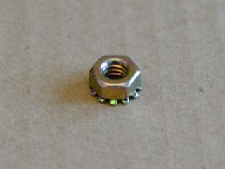 Zollmutter mit Zahnscheibe UNC 1/4"-20 gelb verzinkt